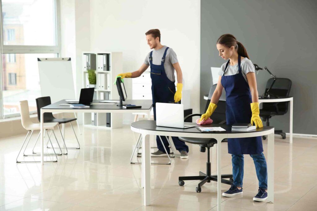 Zwei Lüt bim Aabe für es Reinigungsunternehmen, am Büro putze und für d'beschte Sauberkeit sorge.